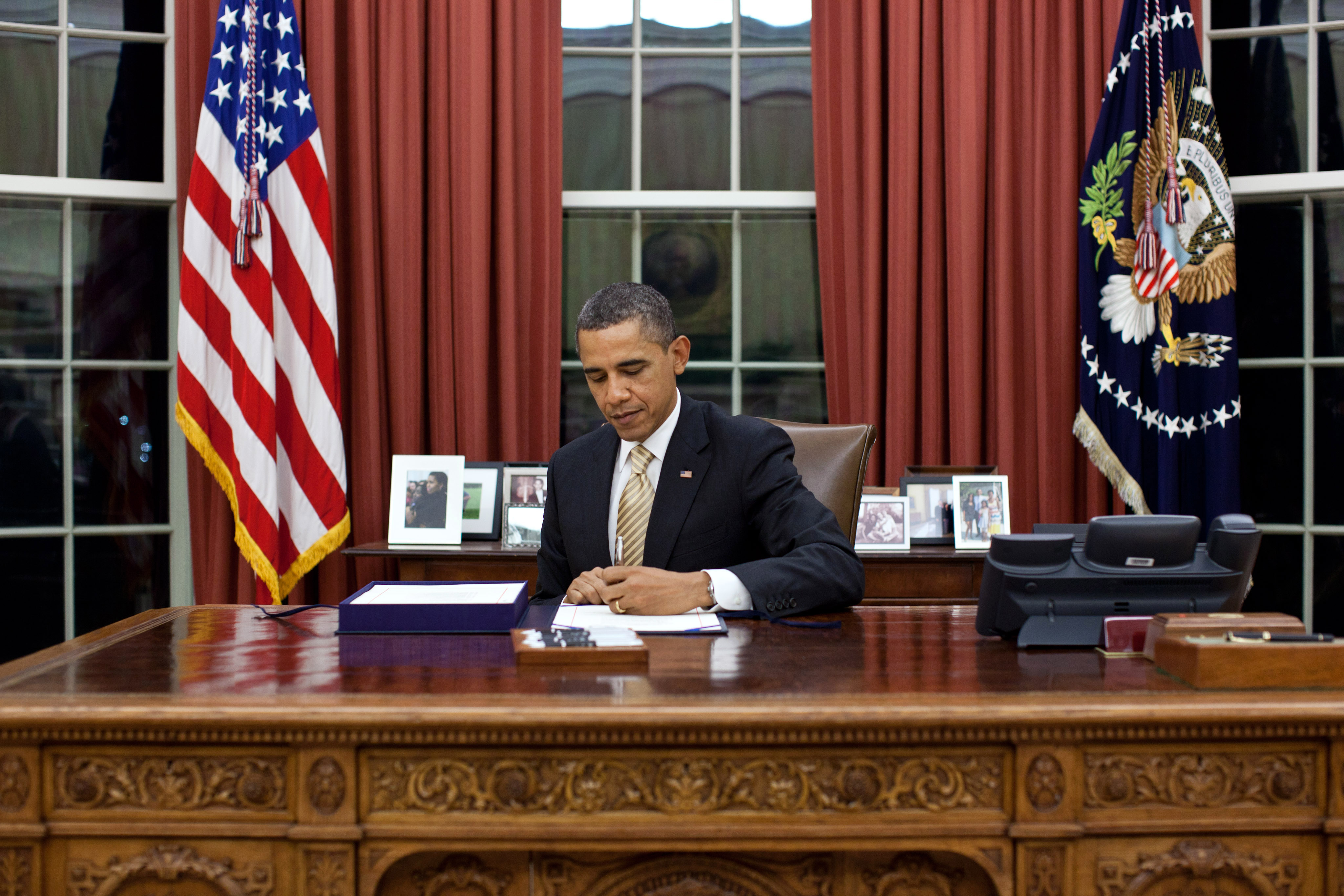 President Obama signs the payroll tax cut (February 22, 2012)